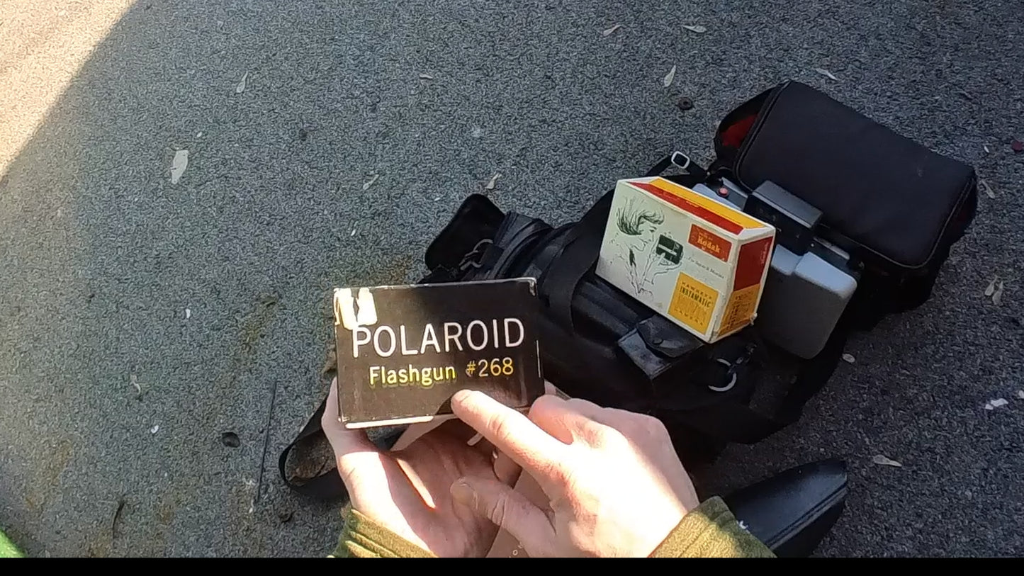 Camera Dumpster Lot, 2 Polaroid Cameras, 2 Camera Bags and More